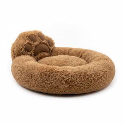 Giant bear paw shaped fluffy brown dog bed on white background product shot